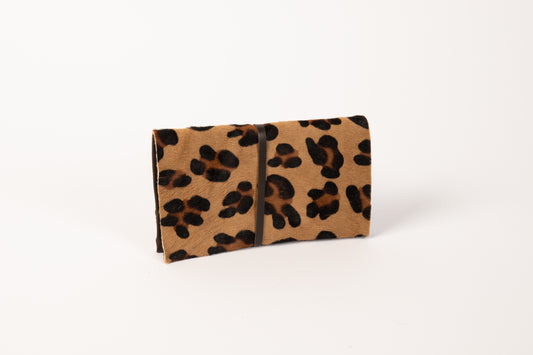 Leopard print hair on leather tobacco pouch