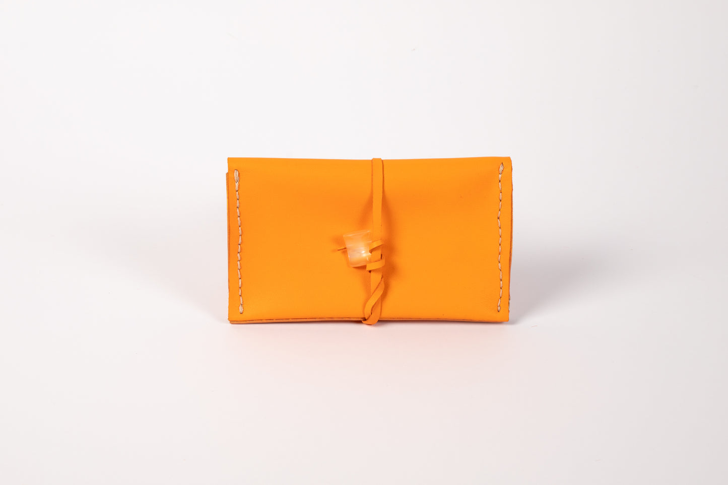 Orange leather tobacco pouch