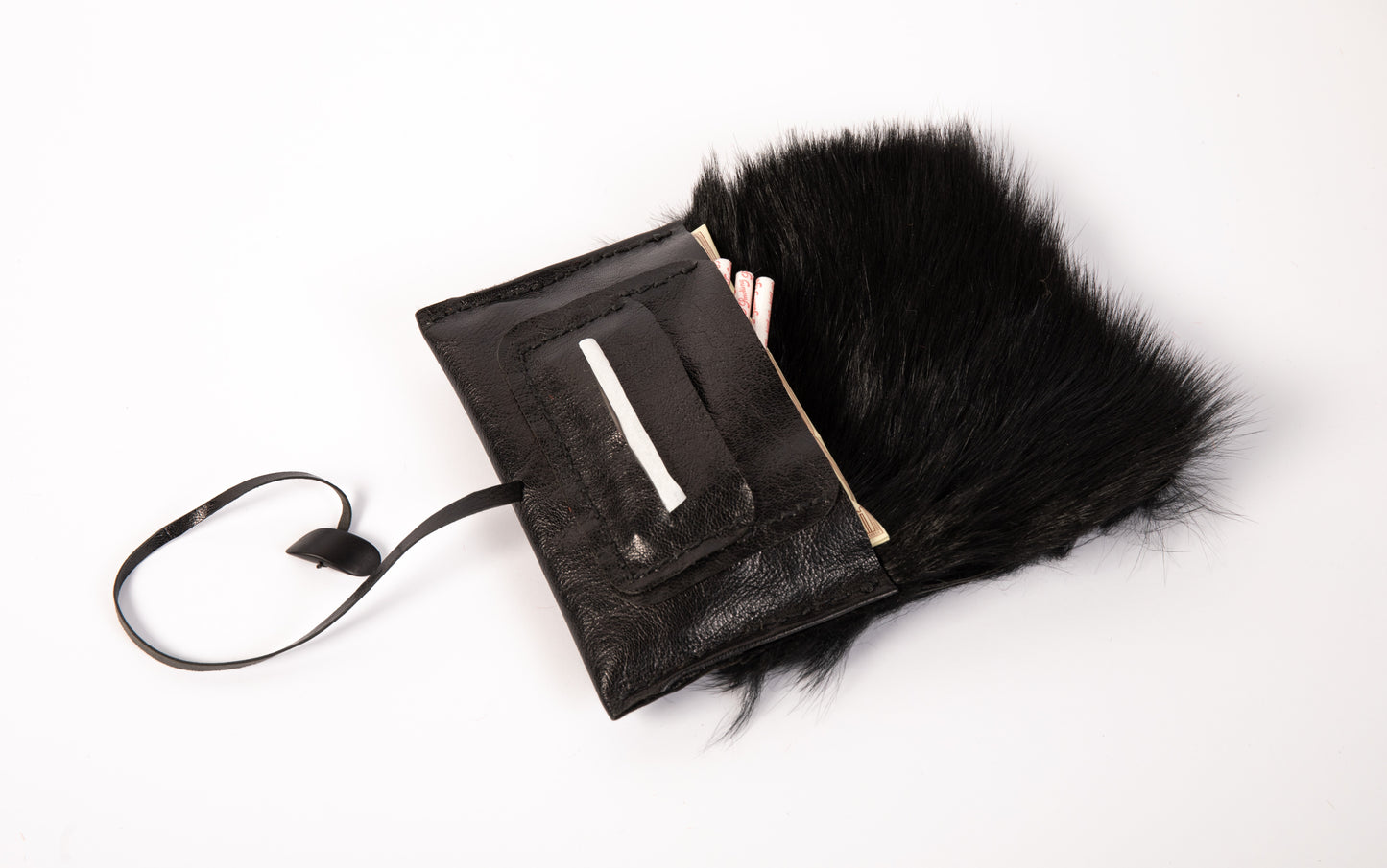 Black fur and leather tobacco pouch